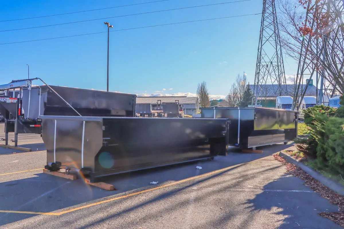Roll-off dumpster ready for waste disposal at job site for Yard Waste Dumpster Rental in Rochester Hills